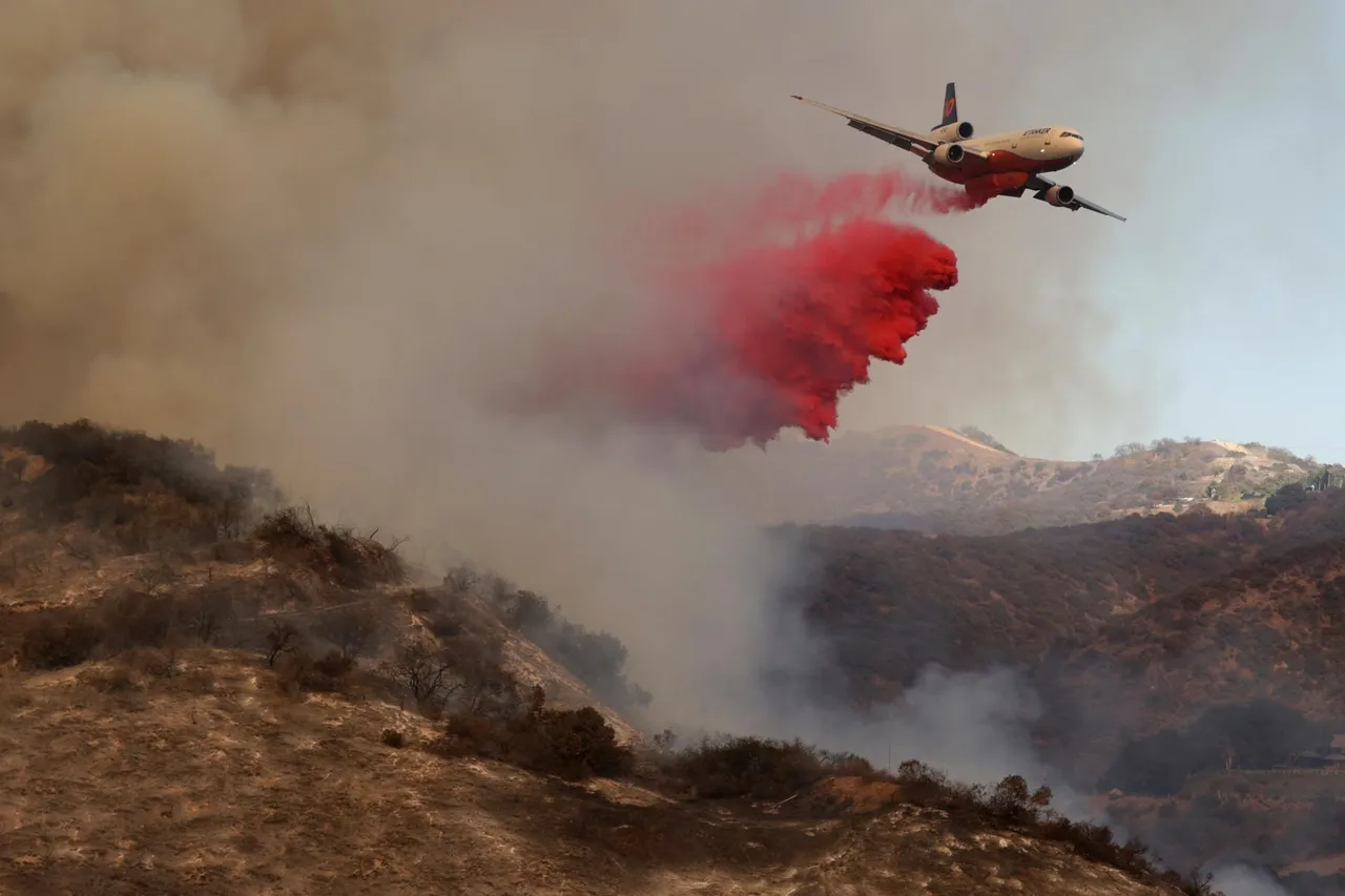 Wildfires continue to rage through Los Angeles area
