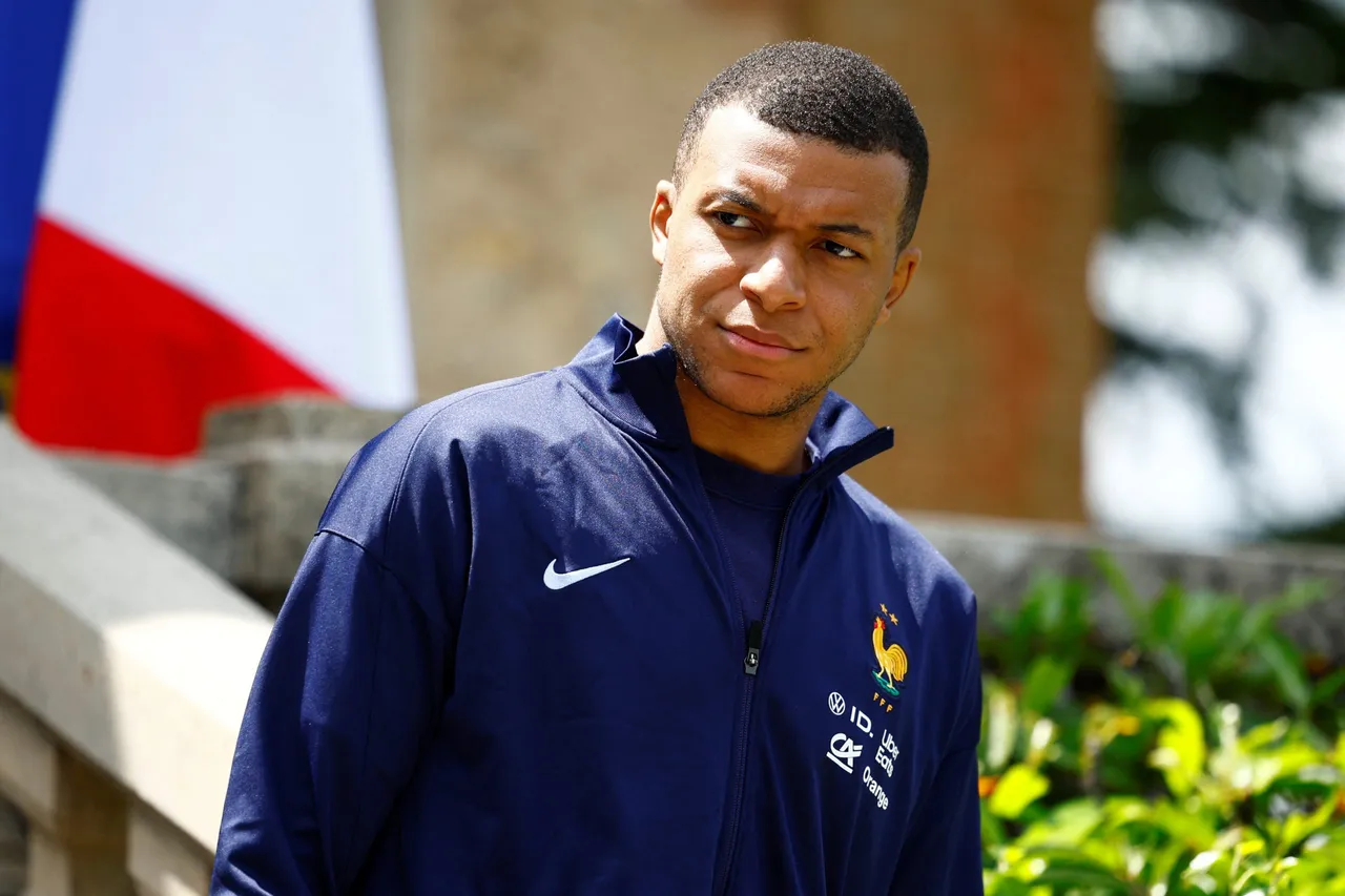 French President Macron visits national soccer team in training camp