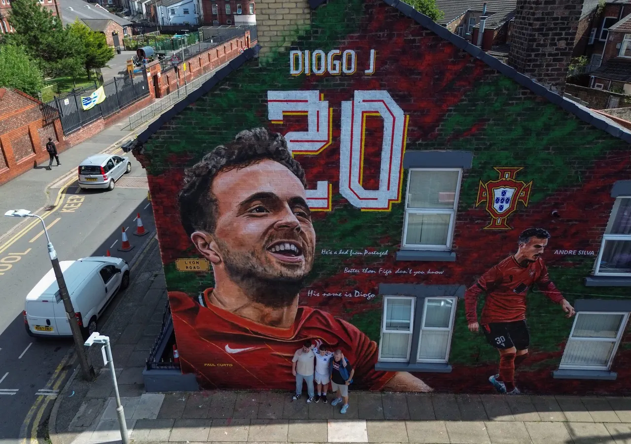 A mural honouring Diogo Jota and Andre Silva appears near Anfield stadium