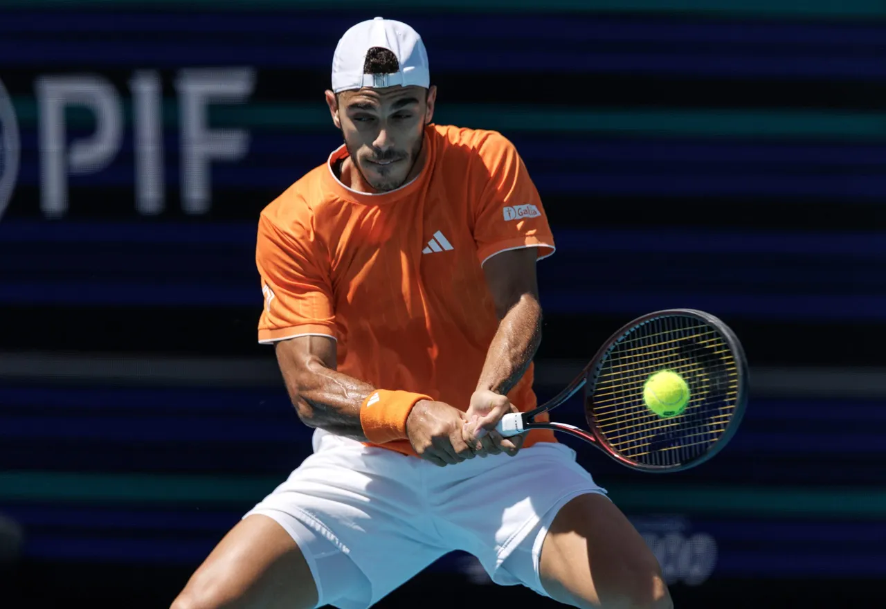 Francisco Cerundolo of Argentina in action against Daniil Medvedev of Russia during the Men's Singles