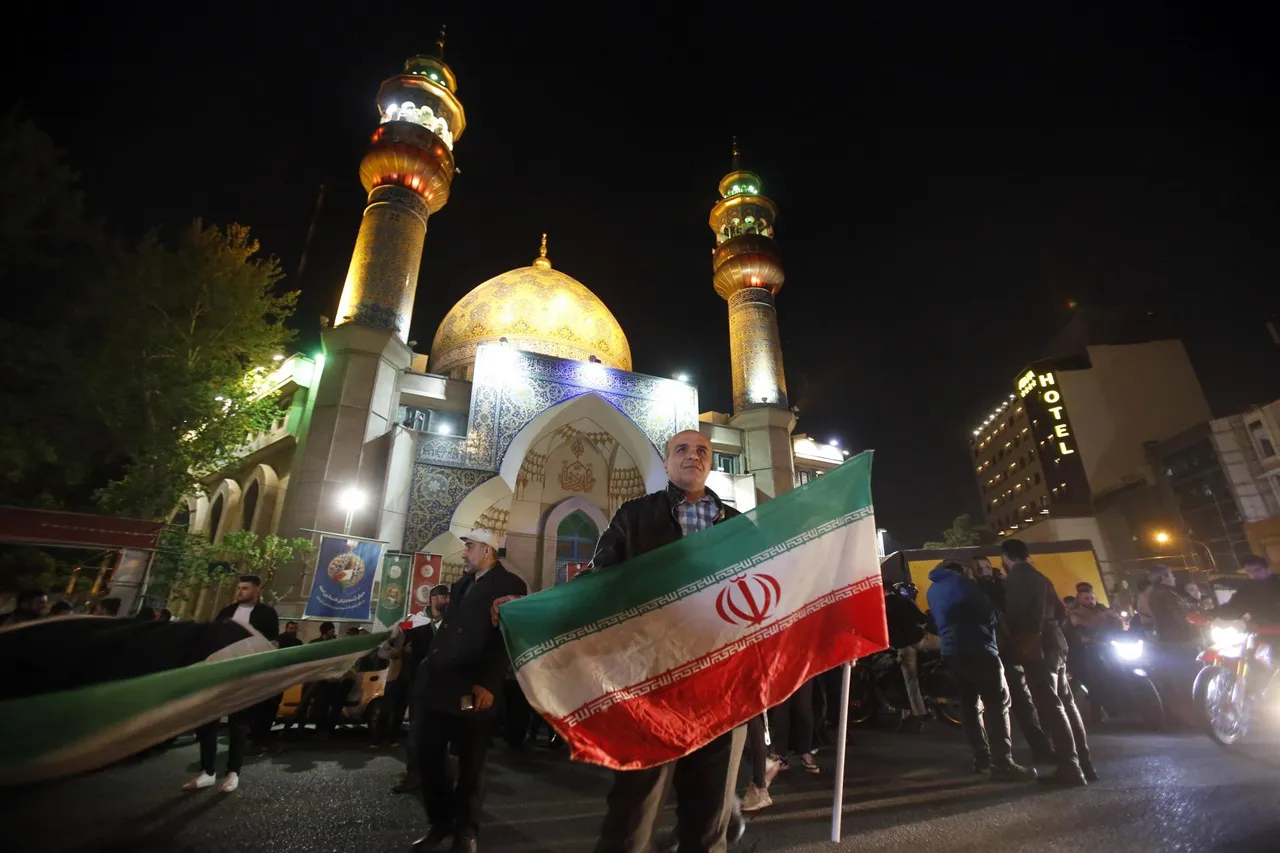 Iranians celebrate following Iran&#8217;s launch of drone attacks towards Israel