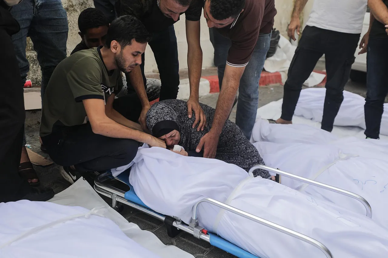 Mourners at Al-Shefa hospital in Gaza City