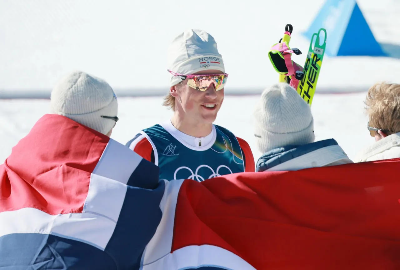 ohannes Hoesflot Klaebo (C) and team Norway celebrate winning in the Men's 4x7.5km Relay of the Cross-Country Skiing