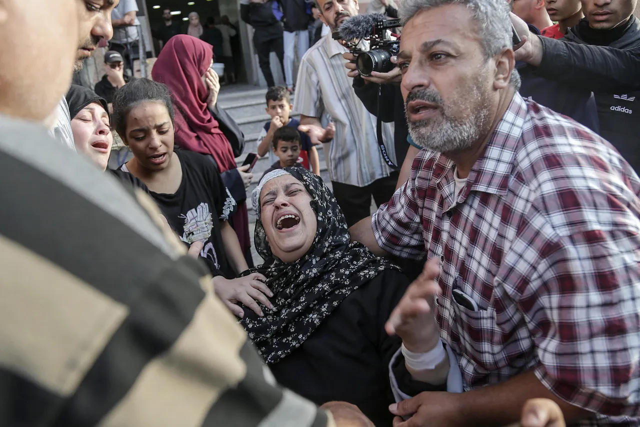 Relatives mourn over loss of beloved ones in Khan Younis, southern Gaza Strip