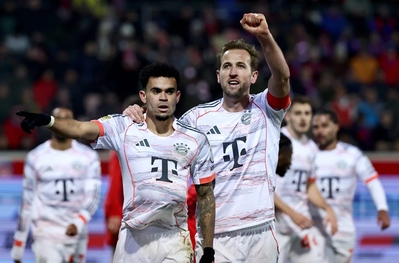 Luis Diaz of Bayern Munich (L) celebrates with teammate Harry Kane after scoring the 0-3 goal during the German
