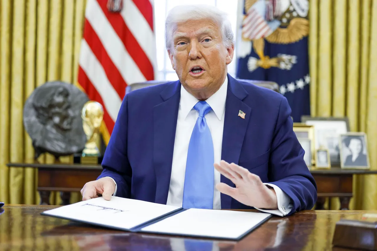 US President Trump signs executive order in the Oval Office
