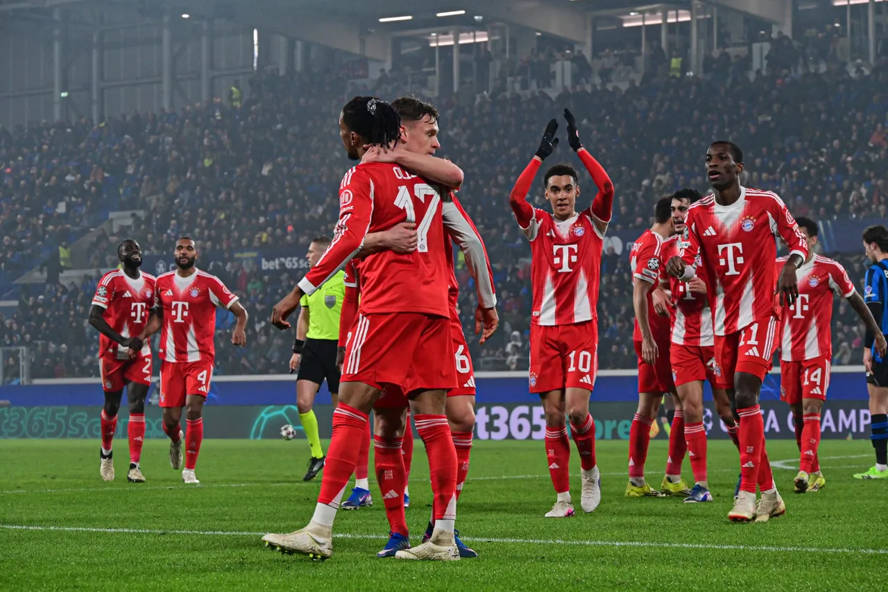 Bayern Munich's Michael Olise (L) celebrates with teammates after scoring a goal during the UEFA