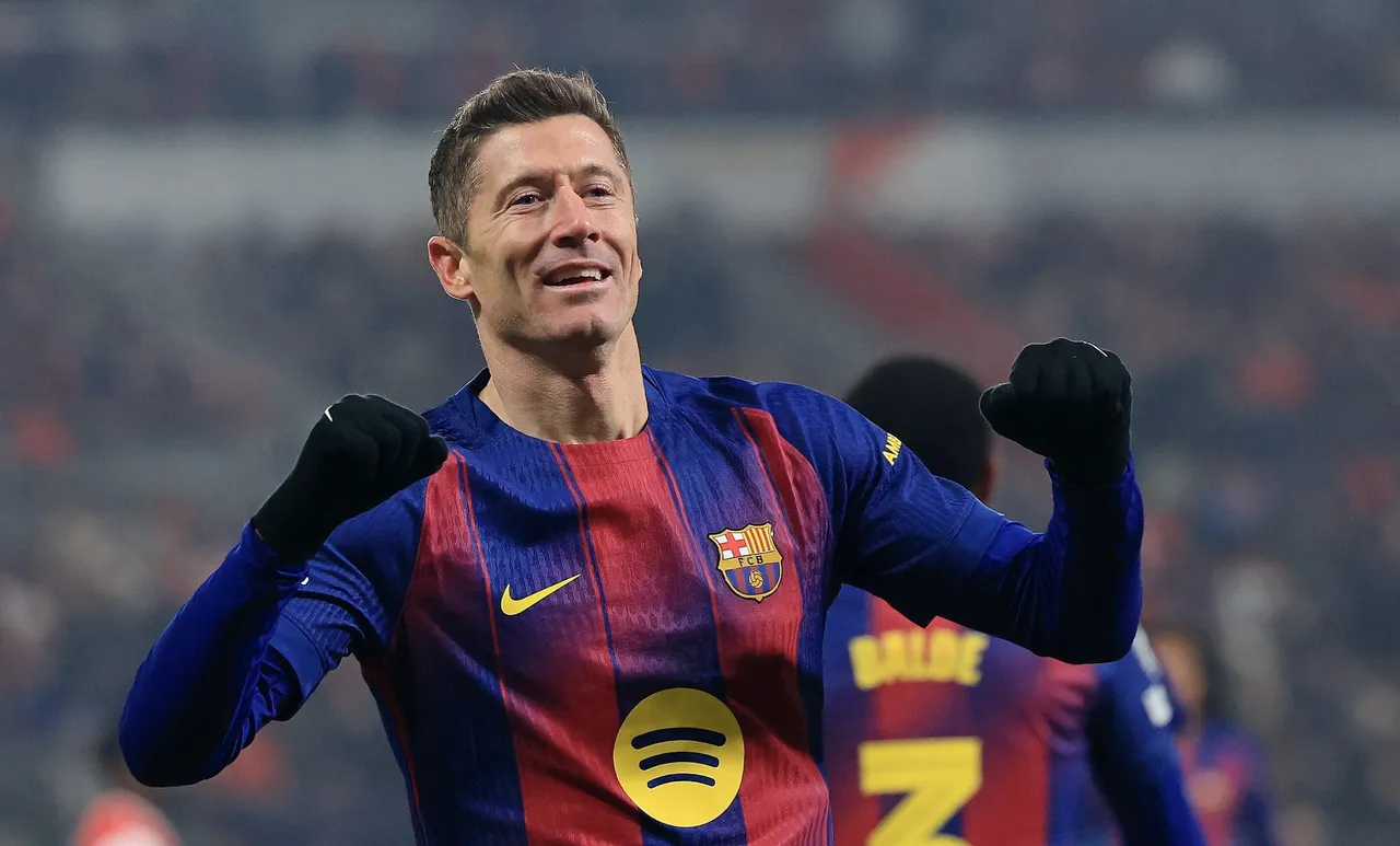 Barcelona's Robert Lewandowski celebrates scoring the 2-4 goal during the UEFA Champions League
