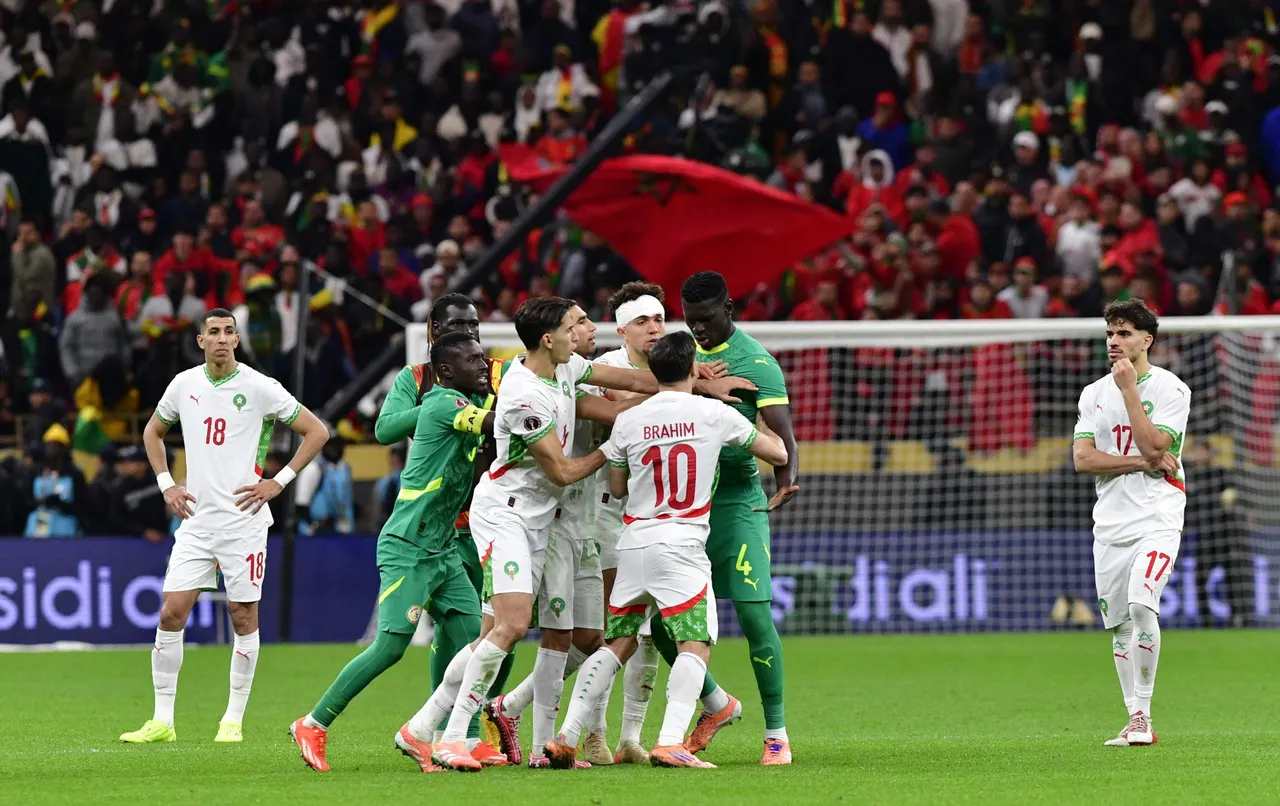Abdoulaye Seck (C-R) of Senegal scuffles with Brahim Diaz (C) of Morocco during the CAF Africa