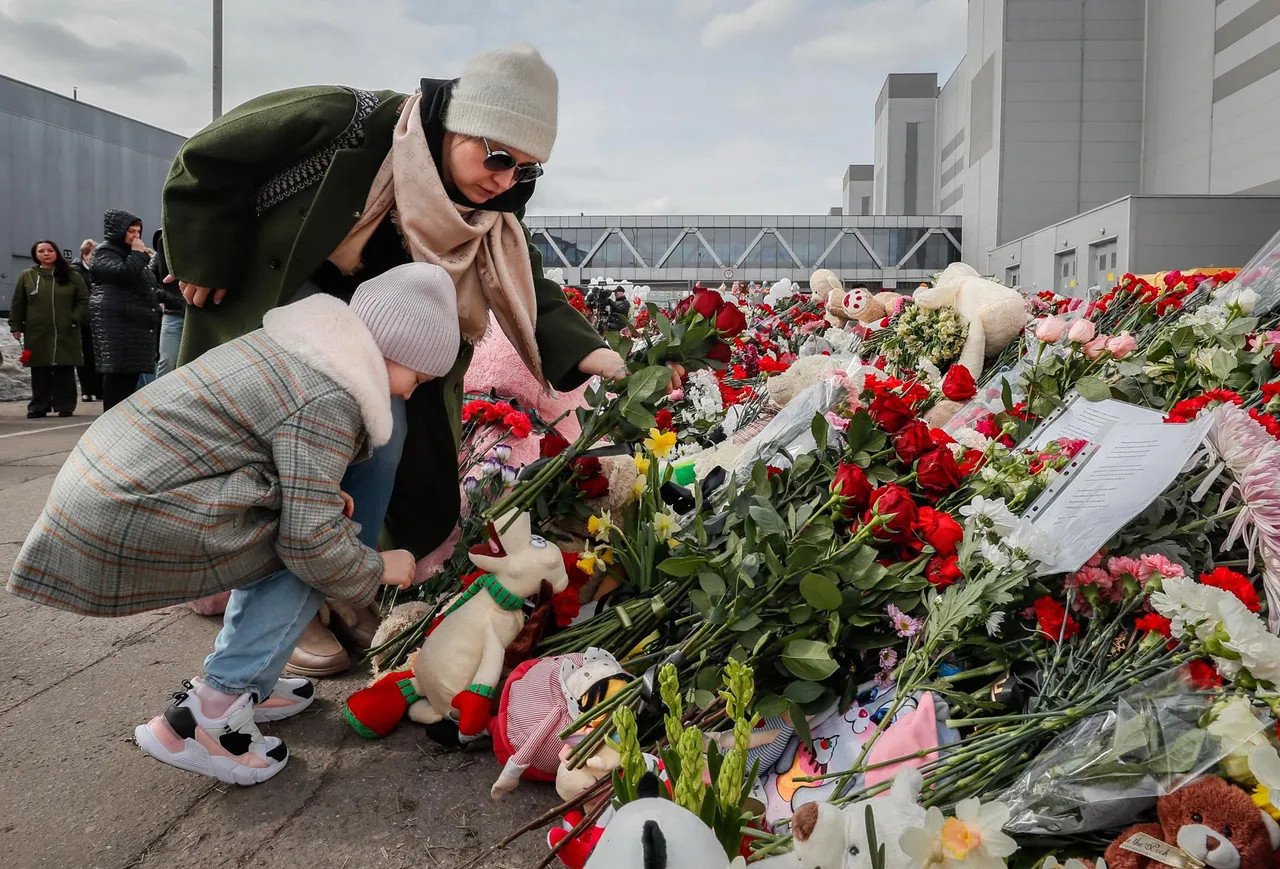 Mourners gather at victims&#8217; memorial four days after Krasnogorsk attack