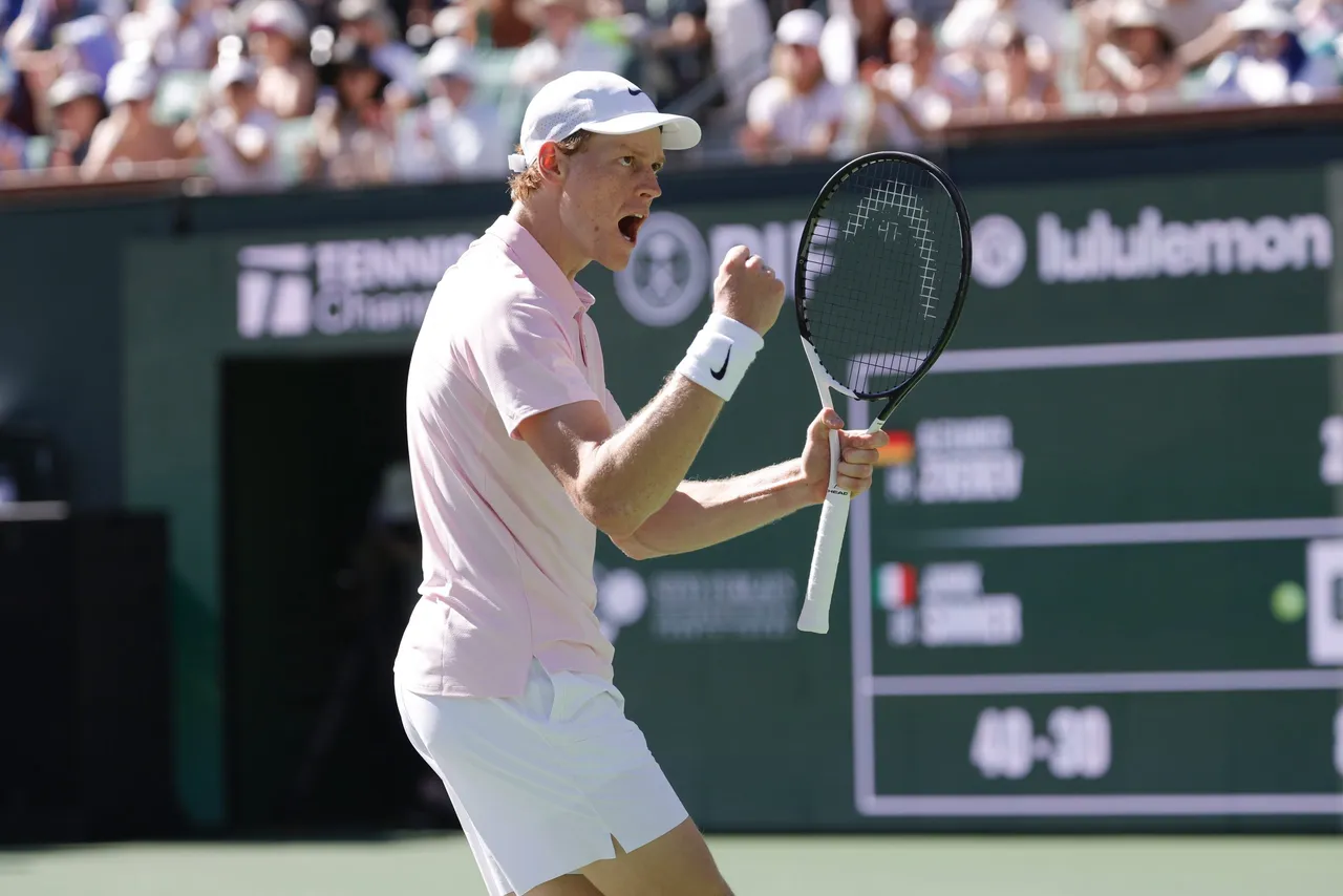 Jannik Sinner of Italy reacts after winning match point during the men’s singles semifinal