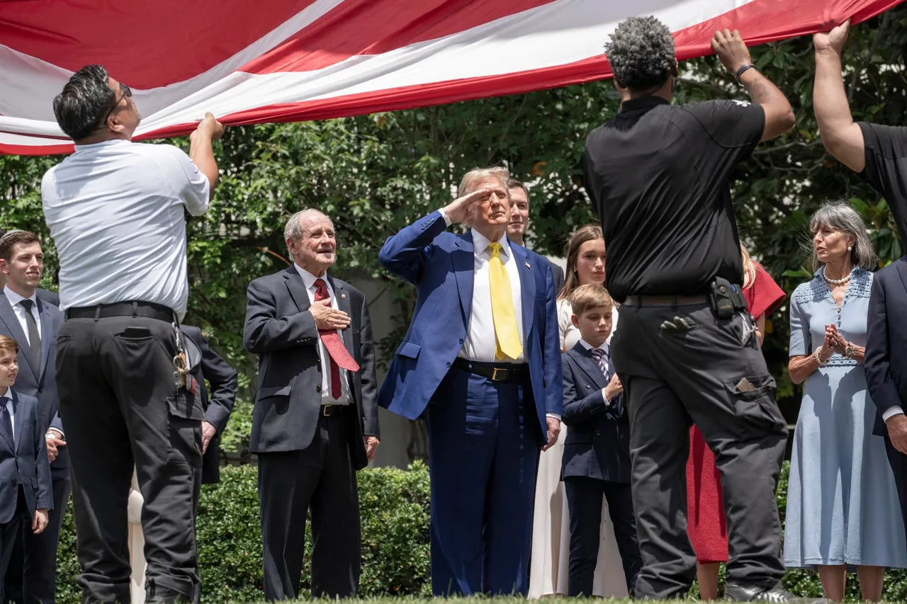 A new flagpole is installed on the South Lawn of the White House