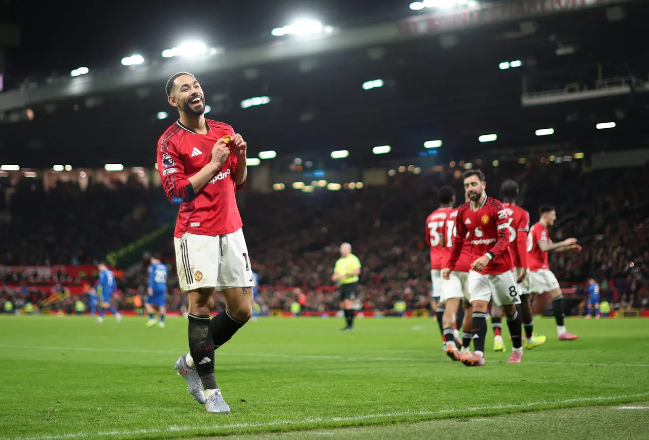 Matheus Cunha of Manchester United celebrates scoring the 4-3 goal during the English Premier League match between Manchester