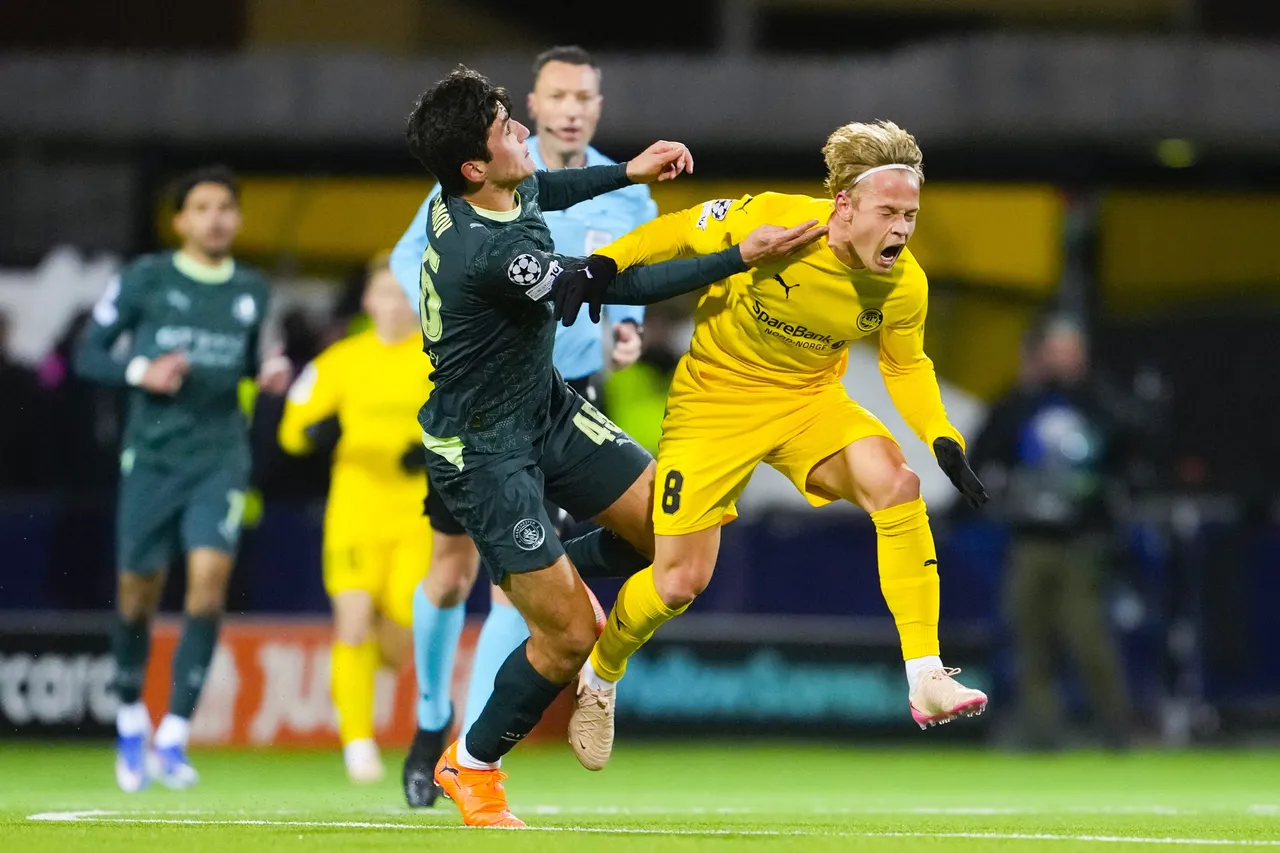 Manchester City's Abdukodir Khusanov (left) and Bodo/Glimt's Sondre Auklend during the UEFA Champions League soccer match between Bodo/Glimt
