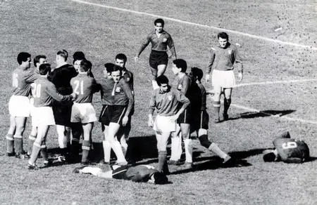 World Cup Finals, 1962. Santiago, Chile. 2nd June, 1962. Italy 0 v Chile 2.  English referee Ken Aston tries to bring order after fighting broke out between Italian and Chilean players during their group two match dubbed as &#8220;The Battle of Santiago&#8221;.  Chile