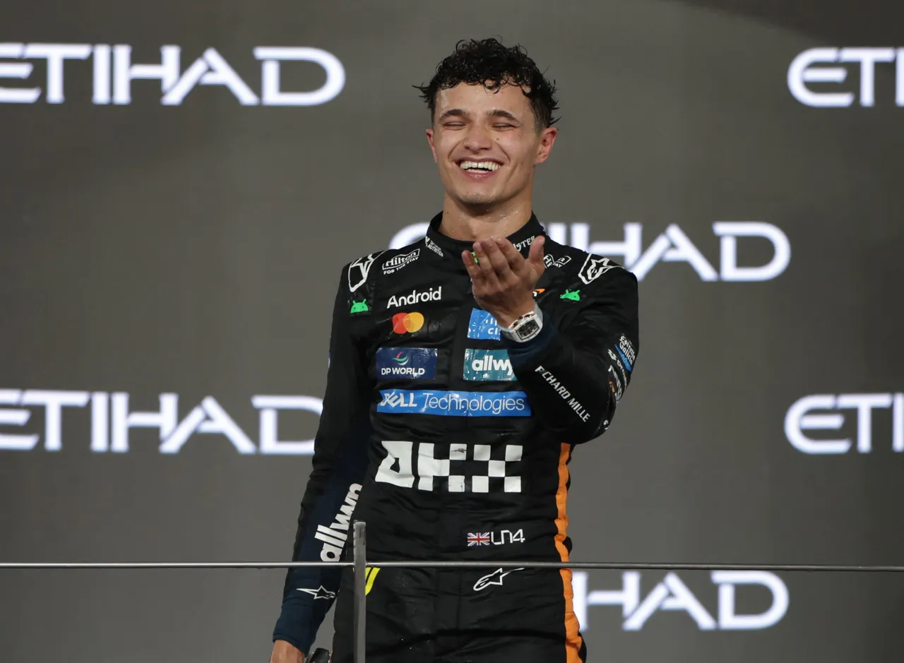 hird placed McLaren driver Lando Norris of Britain celebrates on the podium winning the 2025 Formula 1