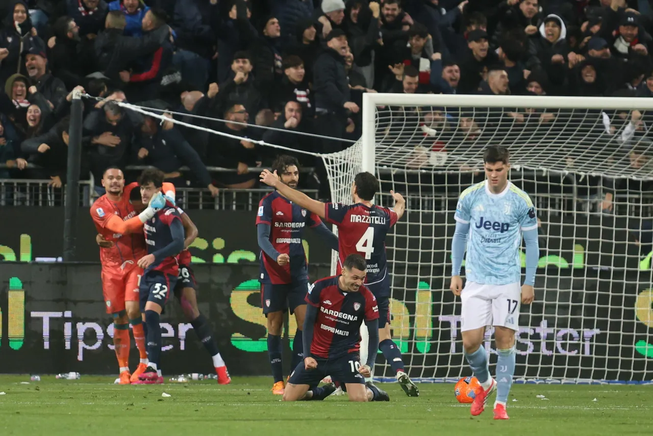 Players of Cagliari celebrate the victory at the end of the Italian Serie A soccer match between Cagliari Calcio and Juventus