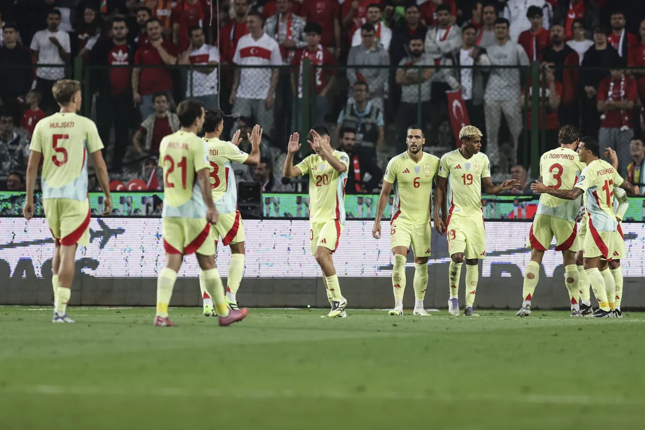 Players of España celebrate after scoring the 0-4 goal during the FIFA World Cup 2026
