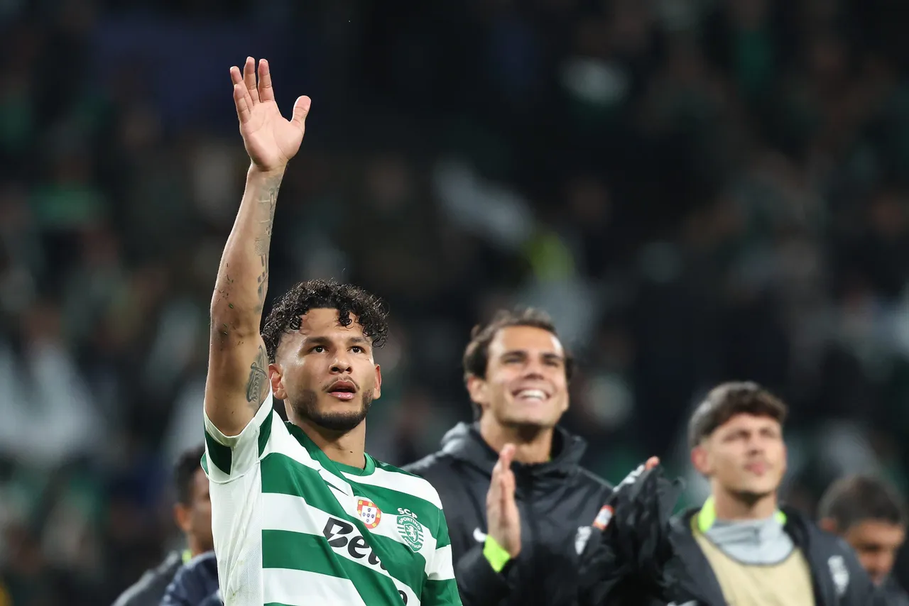 Sporting player Luis Suarez celebrates with supporters after winning the UEFA Champions League