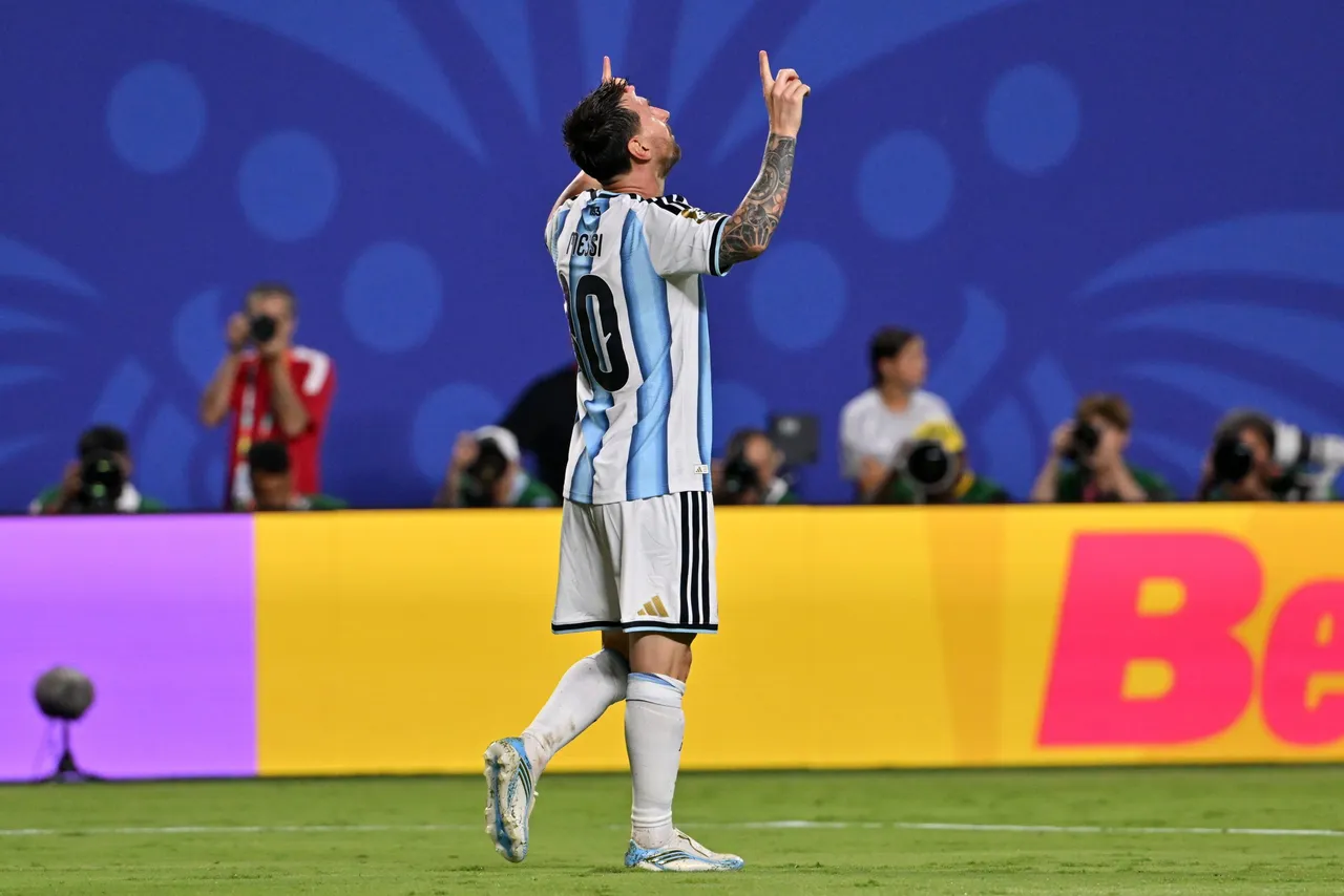 Lionel Messi of Argentina celebrates scoring the 3-0 goal during the FIFA World Cup
