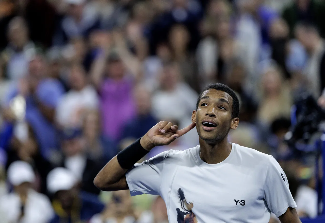 elix Auger Aliassime of Canada celebrates his victory against Alexander Zverev