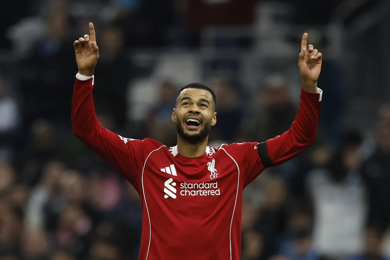 Cody Gakpo (C) of Liverpool FC celebrates after scoring the 0-3 goal during the UEFA Champions League