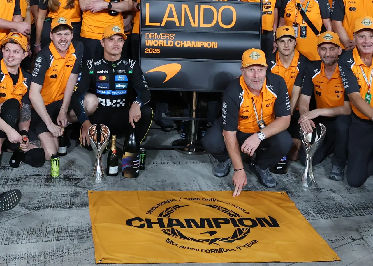 McLaren driver Lando Norris (C-L) of Britain poses with McLaren Racing CEO Zak Brown