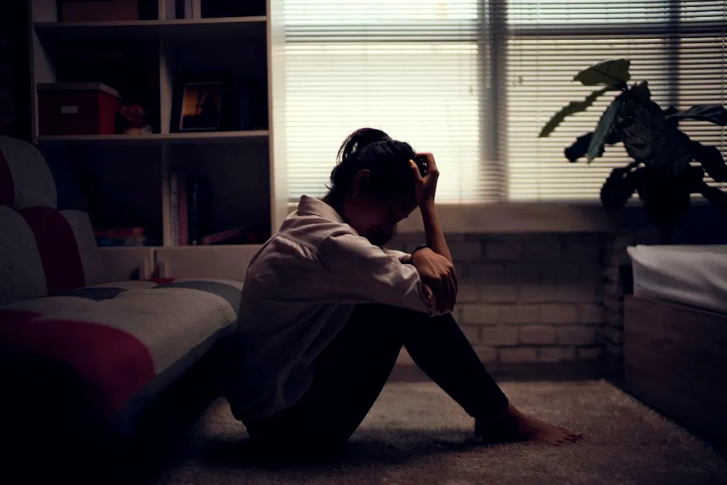 Business woman is depressed. She felt stressed and alone in the house.