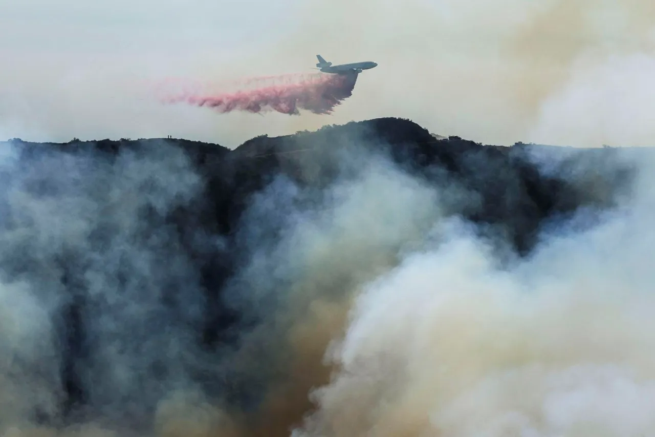 Wildfires continue to rage through Los Angeles area