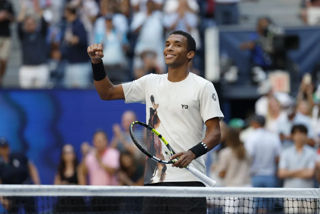 Felix Auger Aliassime of Canada celebrates after winning against Alex de Minaur