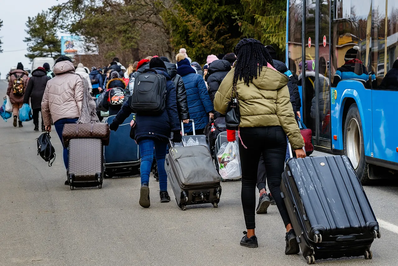 Uzhhorod, Ukraine &#8211; February 26, 2022: Ukrainian Refugees With T