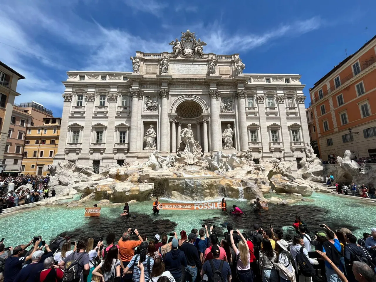 Climate activists pour black liquid into Rome&#8217;s Trevi Fountain
